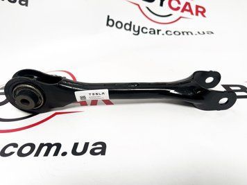 Важіль поздовжній верхній задній лівий Tesla Model 3 18-1044427-00-C 1044427-00-C фото